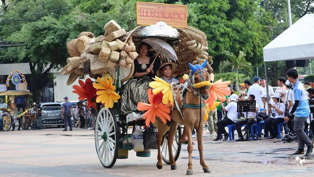 Illustrado Restaurant's entry—basket-filled calesa represented by the establishment's own muse.
